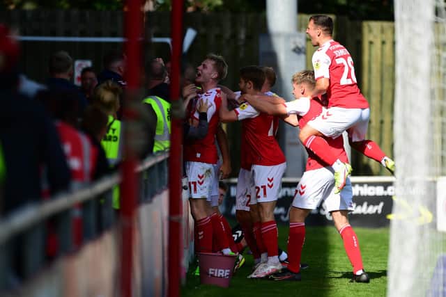 Fleetwood Town's players and fans celebrate their late winner against Plymouth Argyle Picture: Adam Gee.