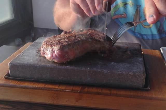 Cooking your own steak on a sizzling volcanic stone was a real treat