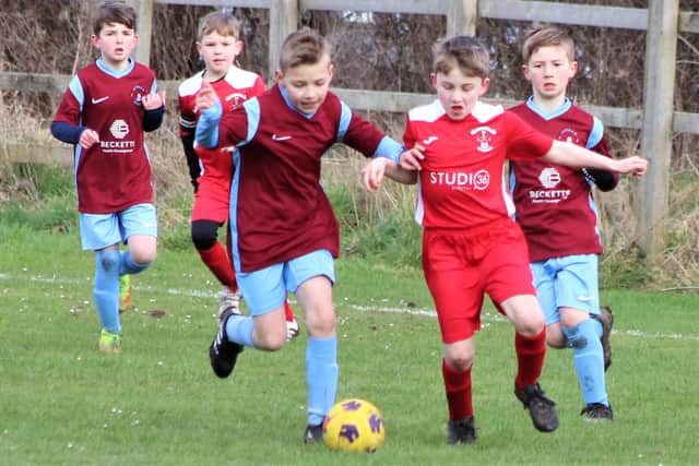 Lytham Junior Maroons and Thornton Cleveleys Lions in under-nines Hogan Cup action   Pictures: B&DYFL