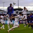 AFC Fylde defender Sam Graham rises highest during their defeat at Boreham Wood Picture: Steve McLellan