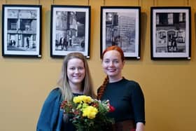 Emilia Zogo (left) with Anna Paprzycka of the Tea Amantes tea room and gallery, during the launch of the photographic exhibition.