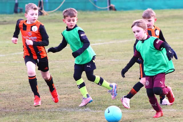 The players from Lytham Junior Maroons and Poulton Town Leopards showed their development Picture: Karen Tebbutt