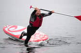 Lib Dem leader Sir Ed Davey falls into lake.