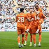 James Husband and Gary Madine starred during Blackpool's win at Coventry