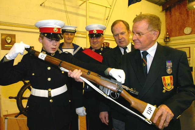 Lytham St Annes Sea Cadets received a £1,000 donation from the Blackpool, Fylde and Wyre Royal Marines Association. Marine Cadet 2 Ross Whiteoak (left) explains the features of a 303 rifle to, from left, Ordinary Cadet Martin Pye, Officer in Charge Sgt Mark Whatmough, Royal Marines Association chairman Mark Smith and treasurer Ray Pinkstone in 2006