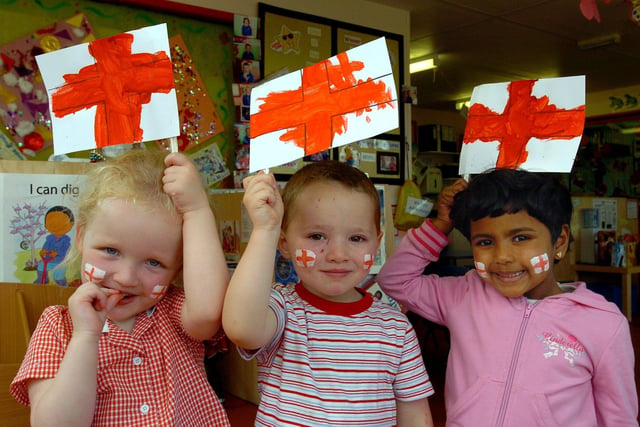 Children from Victoria's Happy Days Nursery, based at Blackpool Victoria Hospital, celebrating St George's Day in 2005. From left, Ellie Baldwin (4), Ben Montgomery (3) and Andrea Christie (3).
