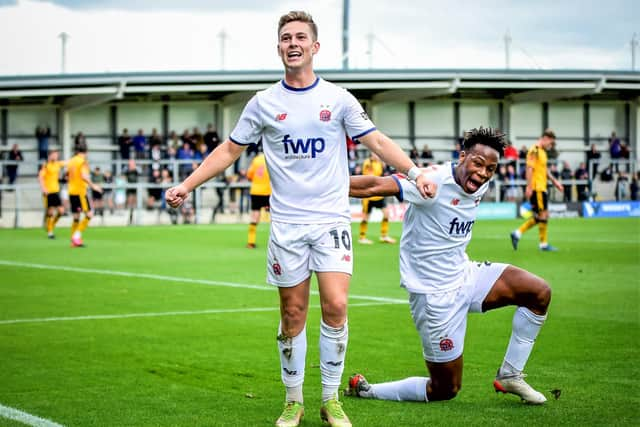 Nick Haughton, celebrates with Siyabonga Ligendza  after opening the score. Photos: Steve Mclellan