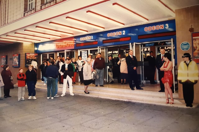 People queuing up ready to see the premiere of Funny Bones in 1995
