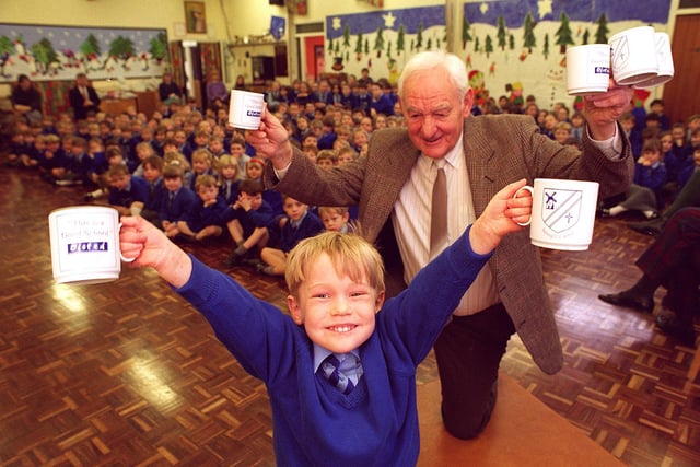 Bill Maclaren, chairman of Governors at Staining CE Primary School presented each child at the School with a commemorative mug, after a glowing OFSTED report