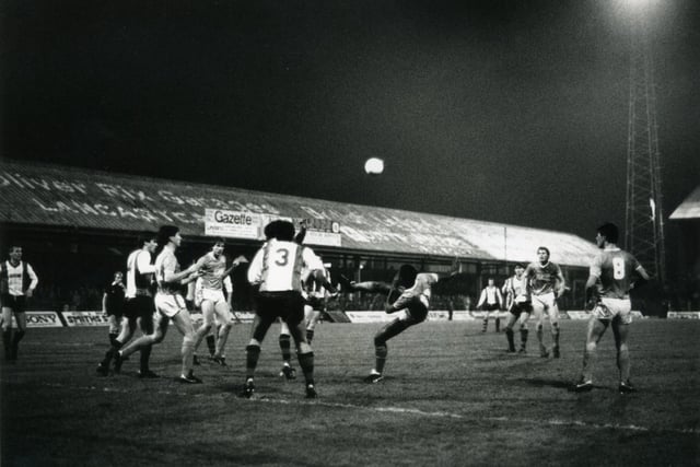Alex Dyer shoots during this 1984 game against Altrincham. Dyer made 108 appearances on the pitch from 1983–1987