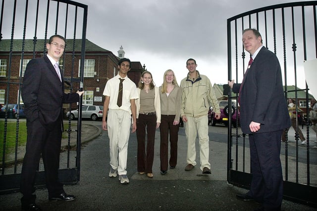 GCSE league table success in 2004. Pictured are head of Sixth Form Andy Riley (left) and Head Roddy McCowan with students Simon Gupta, Sally Ogden, Suzanne Stringfellow and Mark Potter
