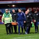 Tharme was stretchered off the pitch during Accrington's game against Lincoln on Saturday