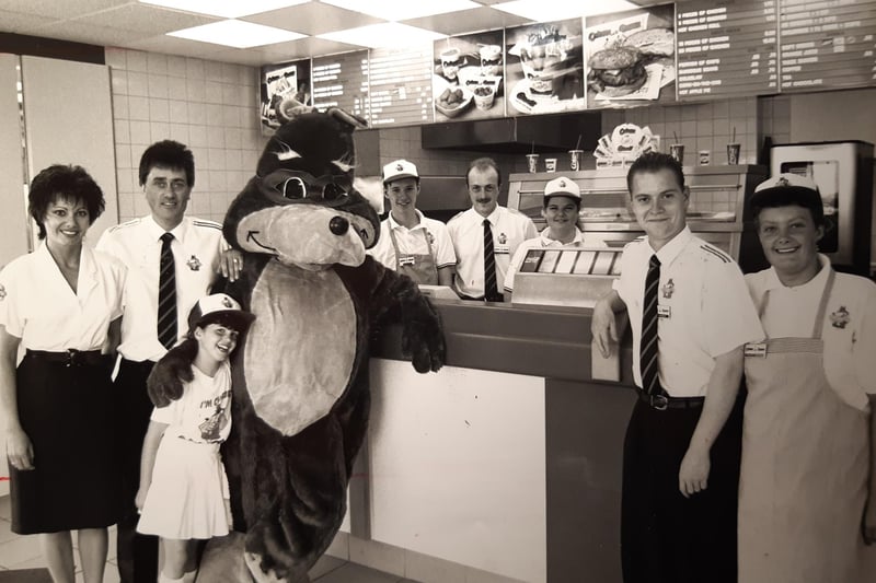 Inside Chicken George - an American fried chicken restaurant in Ocean Boulevard at Blackpool Pleasure beach, 1990. Pictured are Loraine and Paul Churchman, daughter Lisa and Matthew Townsend, Garry Pratt, Sarah Allsup, Stuart Dick and Lorraine Gater. The mascot was George the Fox