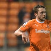 Matt Pennington came off at half-time for Blackpool against Port Vale. An illness could reek havoc ahead of the trip to Port Vale. (Image: Camera Sport)