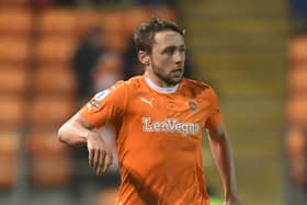 Matt Pennington came off at half-time for Blackpool against Port Vale. An illness could reek havoc ahead of the trip to Port Vale. (Image: Camera Sport)