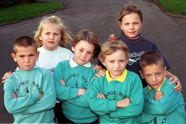 In this picture from 1999, Grange Park School pupils were saddened at vandalism at their school. Pictured front are Martin Ireland who was 6, Ellie Turrel (6) Katie Greatorex (7) and Kyle O'Sullivan (6). Back - Casey Jefferson (7), Chelsea Jefferson (9)