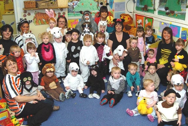 Staff and children dressed in Noah's Ark costumes for Children in Need at Toddle-Inn Nursery, Fleetwood