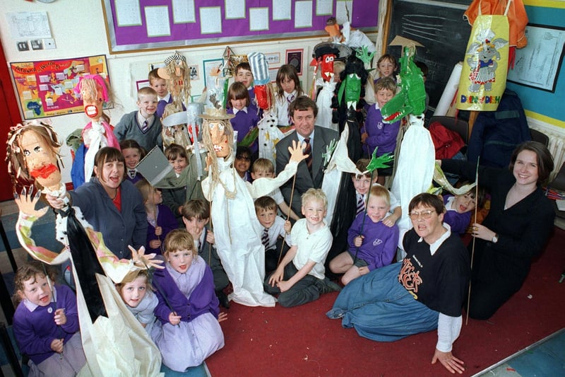 Blackpool Town Centre manager Nigel Hanson, with artist Mary Turner (front), Puppet Festival Director Rachel Riggs (left) and Cathy Meadows (Telewest), right, and some of the children from Thames County Primary School who made puppets