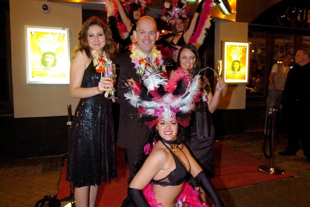 Dominic Herdman with dancers at the opening of Che Bar