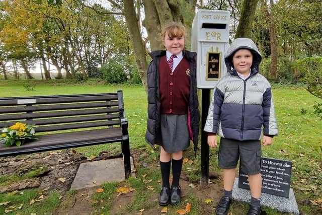 Sienna and Henry Southern send a letter to their dad in heaven, at Lytham Crematorium memorial postbox