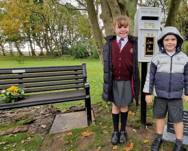 Sienna and Henry Southern send a letter to their dad in heaven, at Lytham Crematorium memorial postbox