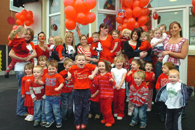 Children and staff at Highfield Day Nursery, South Shore, Blackpool ready to release their balloons for Comic Relief