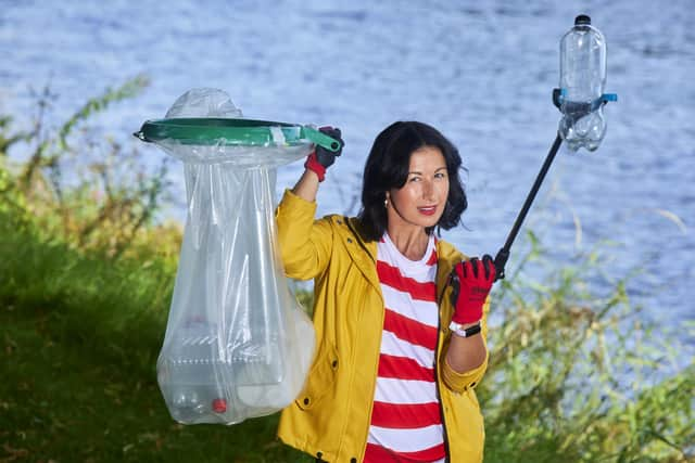 Hayley helps clear up at at Avenham Park in Preston.