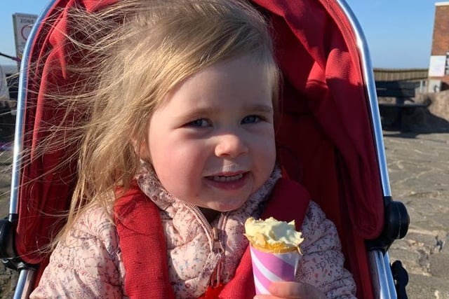 Olivia Mellor, aged two, tucking into an ice cream from Manfredi’s in Bispham today