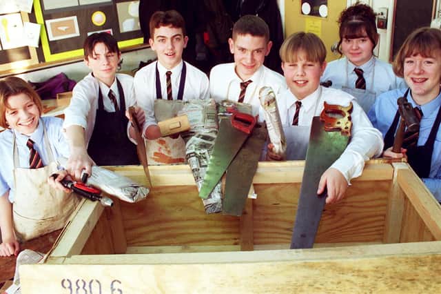 This was in 1997 when pupils had been renovating old tools in order to send them to Tanzania. They were loading up the air freight crate. Are you pictured?