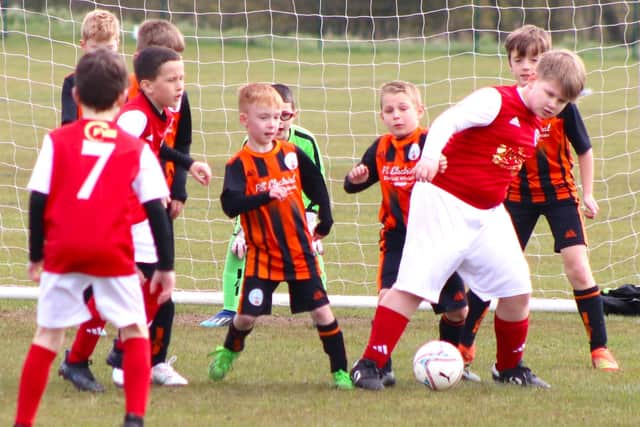 Polish Juniors FC and Poulton Town Pumas provided a match of the week packed with action and tension Picture: Karen Tebbutt