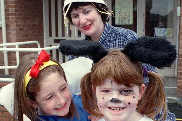 Carleton CE Primary School pupils Charlotte Armstrong and Rebecca Mabbett with Language Co-ordinator Mrs Allyson Barton, dressed in book character costumes, 1998