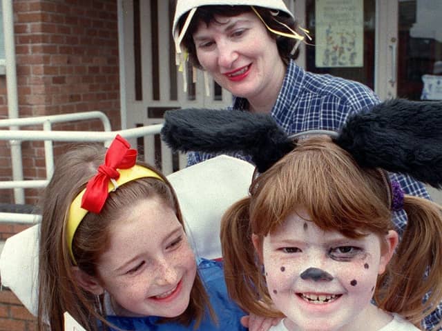 Carleton CE Primary School pupils Charlotte Armstrong and Rebecca Mabbett with Language Co-ordinator Mrs Allyson Barton, dressed in book character costumes, 1998