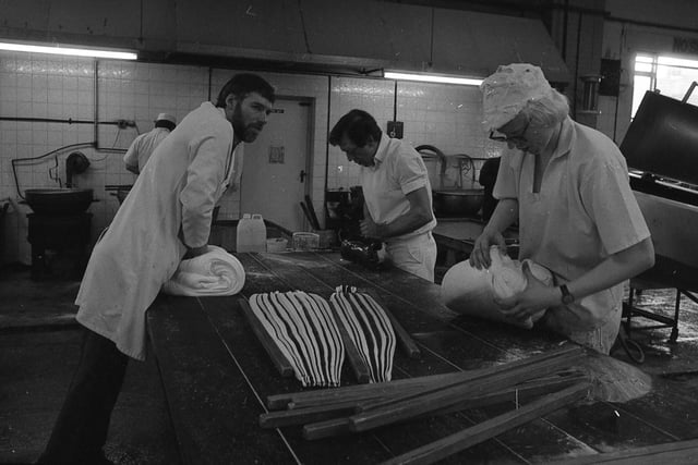 Tony Stayte and Steve Singleton (pictured on the right) are hard at work as managing director Doug Loynds looks on, at Fylde Coast Confectionery Company in Holyoake Avenue, near Bispham