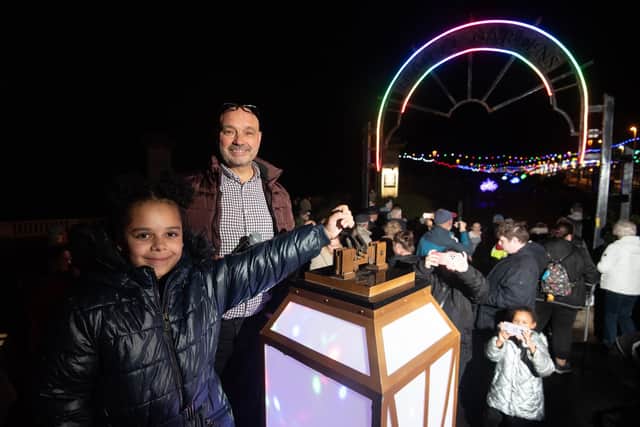 Illuminations switch on at Jubilee Gardens near Gynn Square. The lights were switched on by 10-year-old Ocean Saxton and Eddie Nelder, director of Choice Hotels.