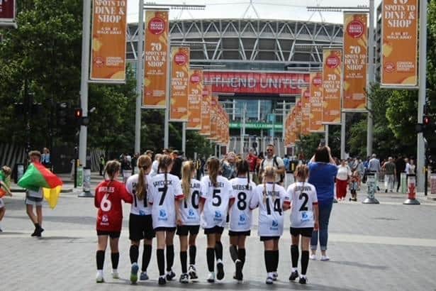 Heyhouses Endowed Church of England Primary School's young footballers approach Wembley Stadium Photo: Aidan Wilson