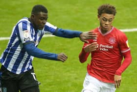 Fisayo Dele-Bashiru (left) has yet to agree a new deal with Sheffield Wednesday with his current contract due to run down at the end of the season