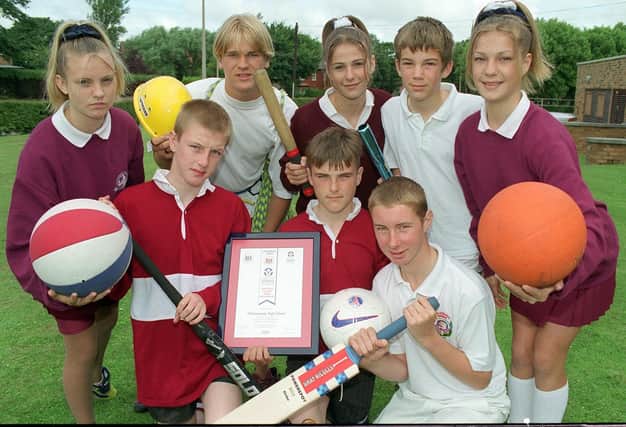 Sports equipment was presented to the school after being awarded the Sportsmark award. Pictured are Daniel Lucas, Shane McGonagle, Chris Gale
Vicki Allan, Richard Jackson, Jenny Jones, Stephen Whitley and Linzi Impett, 1998
