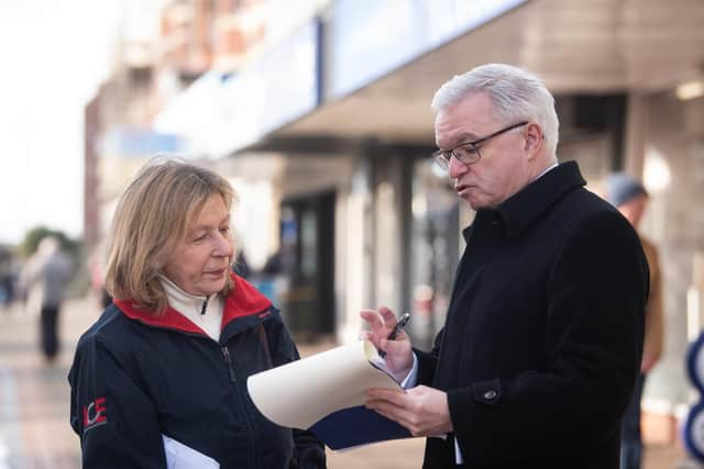 Fylde MP Mark Menzies in St Annes speaking to a resident. Picture: NationalWorld