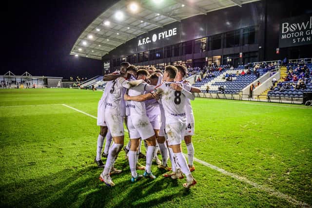 Fylde celebrate after Nick Haughton's penalty sealed victory over Alfreton Picture: STEVE MCLELLAN