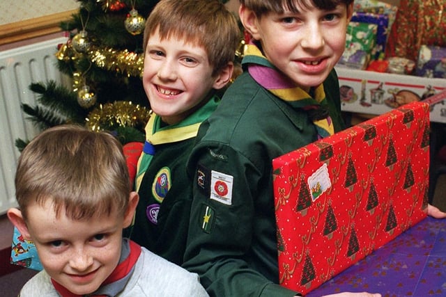Blackpool District Cubs, Scouts and Beavers collected money and presents for the United for Christmas appeal. Pictured are Matthew Kilcoyne, Alan Wrigley and Ben Sly