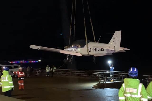 Rescue crews recovering the plane from the beach in South Shore last night (Thursday, November 16). (Picture by Tatiana Dunderdale)