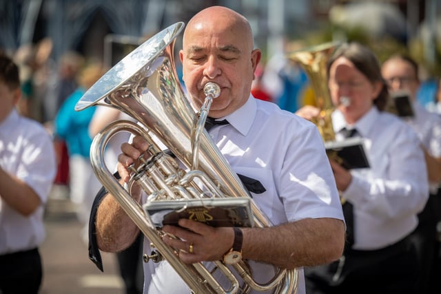 The parade was accompanied by a marching band