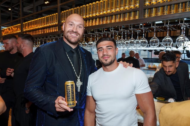 Tyson Fury (left) with his brother Tommy Fury at a party at Piccolo in Manchester to launch his new Furocity Champion energy drink, available in Iceland now. Picture date: Thursday July 27, 2023. PA Photo. Available at Iceland Foods and The Food Warehouse, the flavour of Furocity’s Champion energy drink has been unveiled exclusively to the guests in attendance. Picture credit should read: Dominic Lipinski/PA Wire.