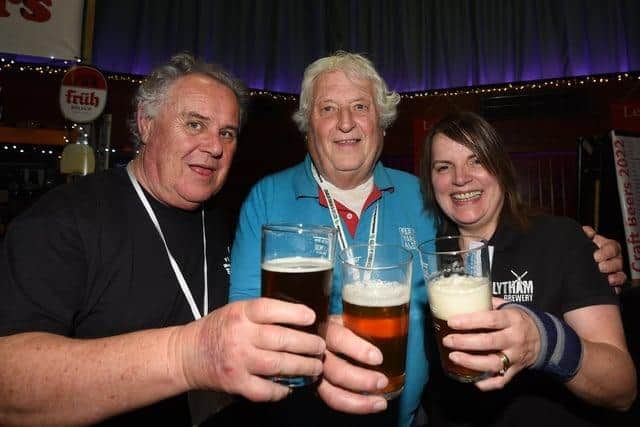 (L-R) Gary Levin, Ray Jackson and Jo Monk toast a successful event after Fleetwood Beer and Cider Festival 2022. Photo: Michelle Adamson