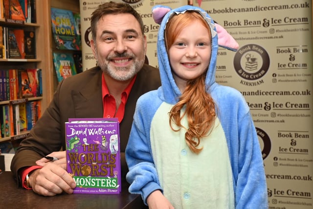 LANCASHIRE POST - BLACKPOOL - 15-07-23 Celebrity, comedian and children's author David Walliams promotes his new book, The World's Worst Monsters, at Book Bean and Ice Cream, Kirkham, where he met excited fans and their parents, signed booked and posed for photographs.