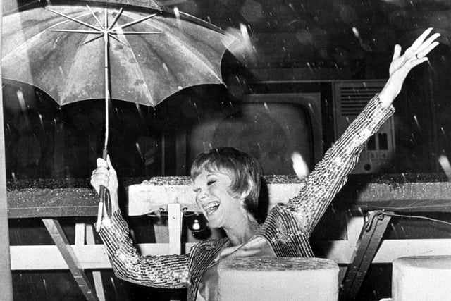 The rain came down for TV sitcom star Wendy Craig at the 1974 Illuminations switch on
