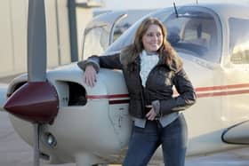 Carol Vorderman with her private plane 'Mildred' after passing her pilot's licence (PPL) test in 2013. (Photo by Tim Ireland/PA Images via Getty Images)