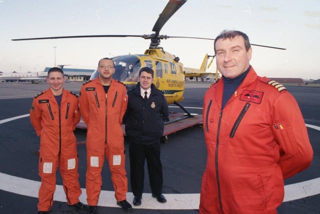 Flight paramedics Allan Dunn and Richard Peters, operations manager Wayne Ashton, and pilot Capt Iain King, of the Lancashire North West Air Ambulance, who have made nearly 300 life-saving missions since its launch nine months ago