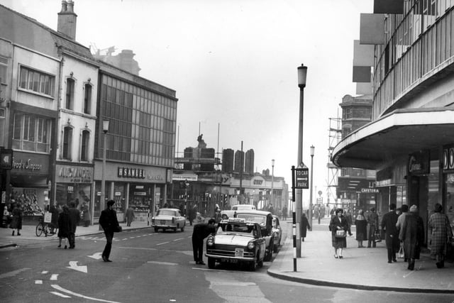 This photo from 1962 shows Orry's outfitters at the corner of Church Street and Bank Hey Street, making way for the Lewis's store as the Palace block is demolished. H Samuel and British Home Stores