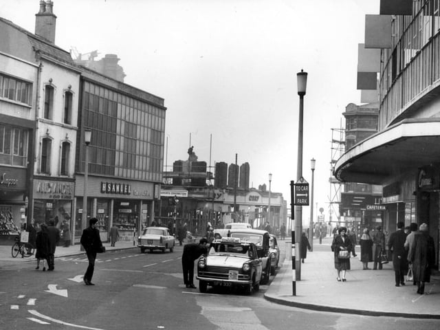 This photo from 1962 shows Orry's outfitters at the corner of Church Street and Bank Hey Street, making way for the Lewis's store as the Palace block is demolished. H Samuel and British Home Stores